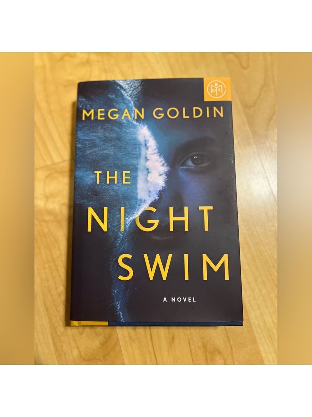 The Night Swim by Megan Goldin - Navy & Yellow Hardcover
